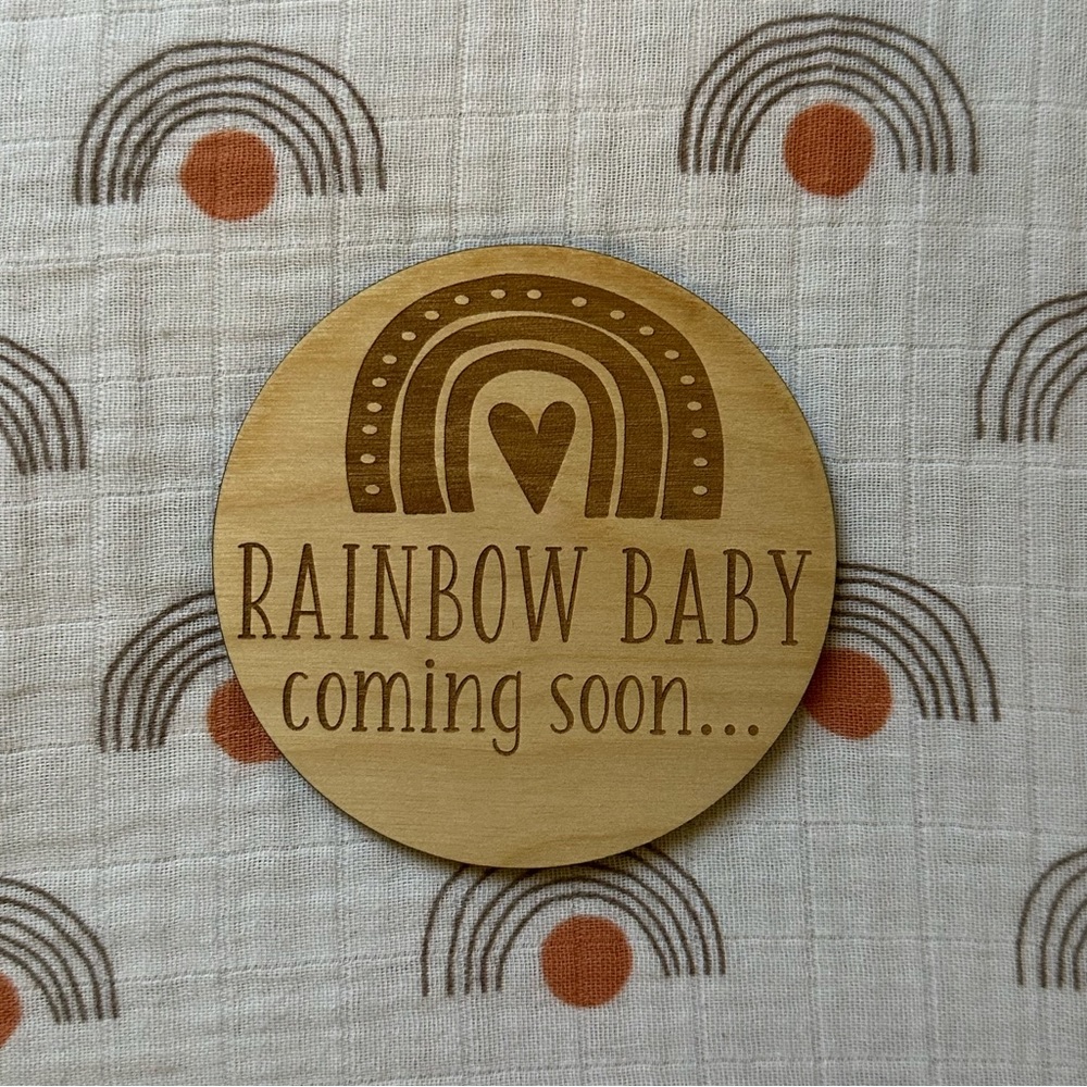 Rainbow baby coming soon sign